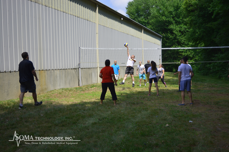 Employees at Soma Tech IntlPlaying Volleyball